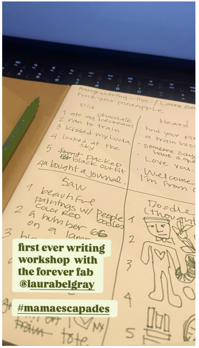 Close-up of a notebook filled with handwritten notes and doodles from a writing exercise, with a green pen nearby; overlaid text reads “first ever writing workshop with the forever fab @laurabelgray” and “#mamaescapades.”