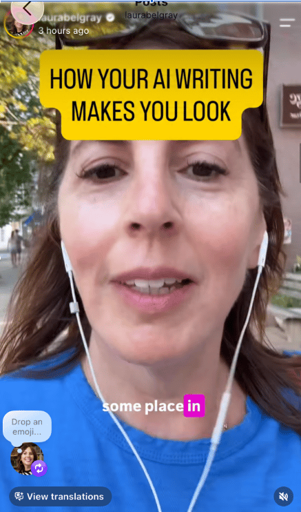 Screenshot of an Instagram video post by @laurabelgray, posted 3 hours ago. Laura Belgray is wearing a blue shirt and wireless earbuds, with sunglasses pushed up on her head, is filming outdoors on a city sidewalk. A yellow text overlay reads 'HOW YOUR AI WRITING MAKES YOU LOOK.' Below, text reads 'some place' with a LinkedIn logo icon. At the bottom left is a comment prompt reading 'Drop an emoji...' with a small profile icon, and a 'View translations' button. A mute icon appears at the bottom right.