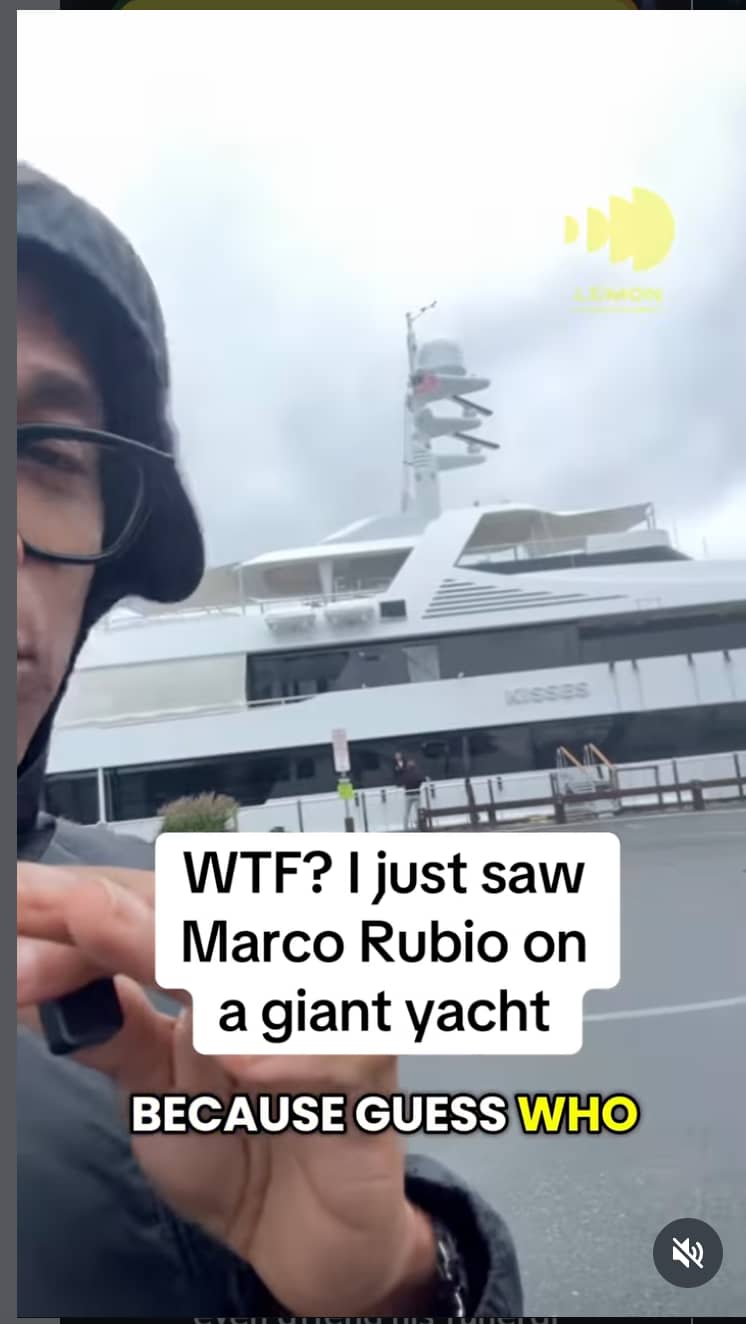 Screenshot of a social media video showing part of Don Lemon’s face in front of the yacht KISSES. Overlaid text reads, “WTF? I just saw Marco Rubio on a giant yacht” and “BECAUSE GUESS WHO.”