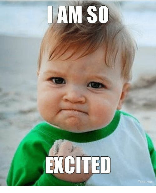 Toddler on the beach with a fist full of sand, a little bit on their pursed lips with "I'm so excited" written on the photo.