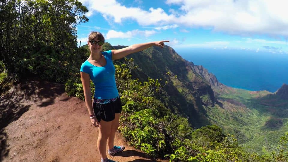 women point on the Kalalau trail in Hawaii
