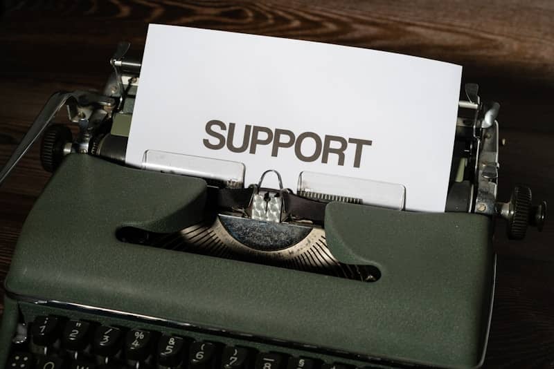 a close up of a typewriter with a paper on it