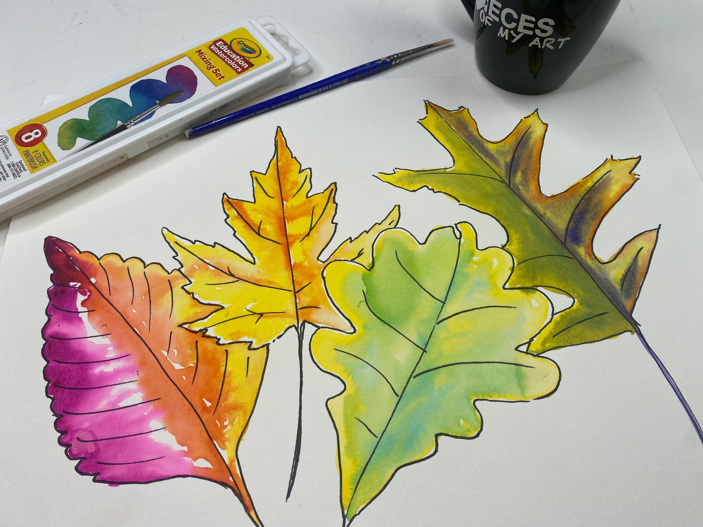 Hand-painted watercolor fall leaves with real autumn leaves on watercolor paper