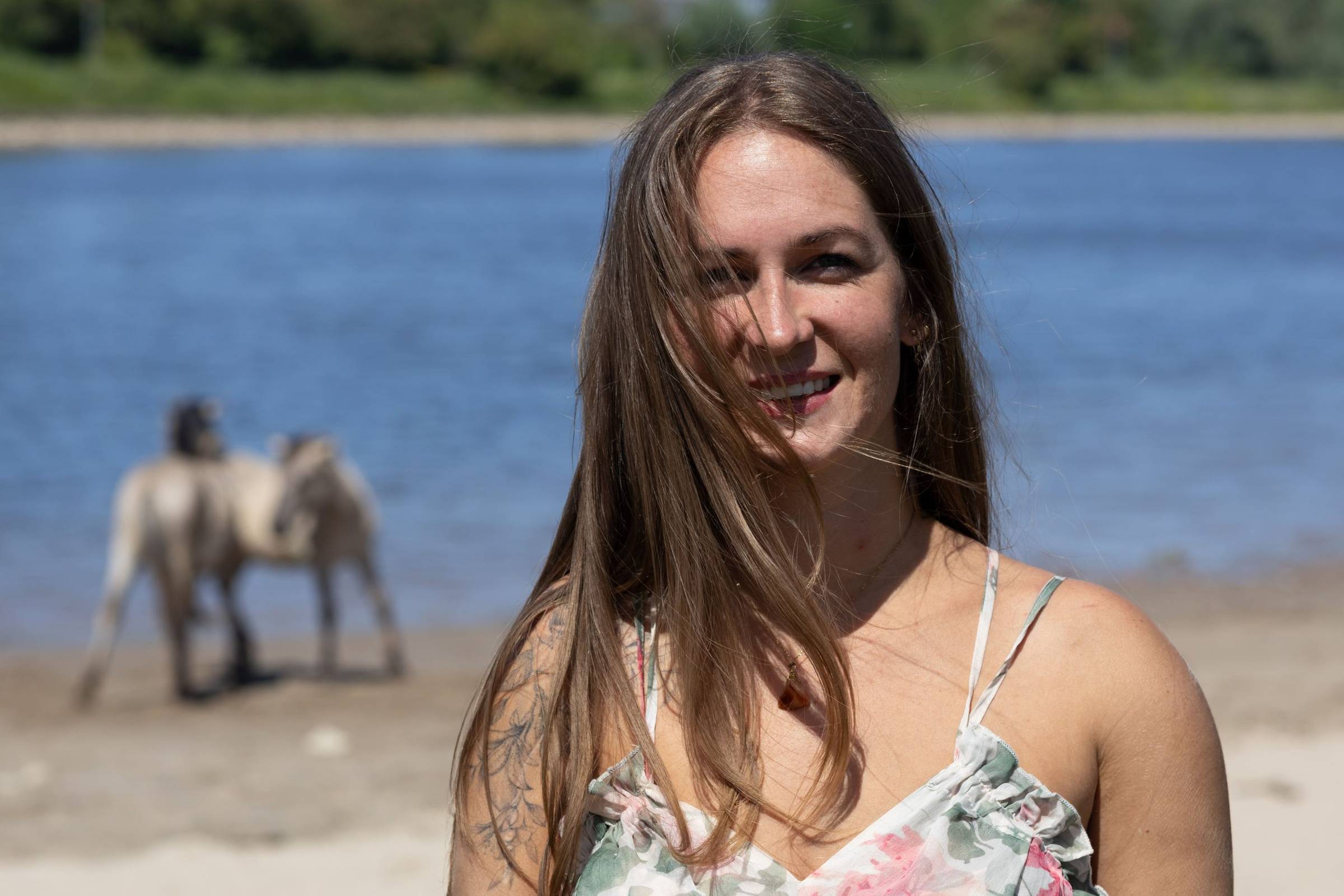 Woman holds the sun in her hand.