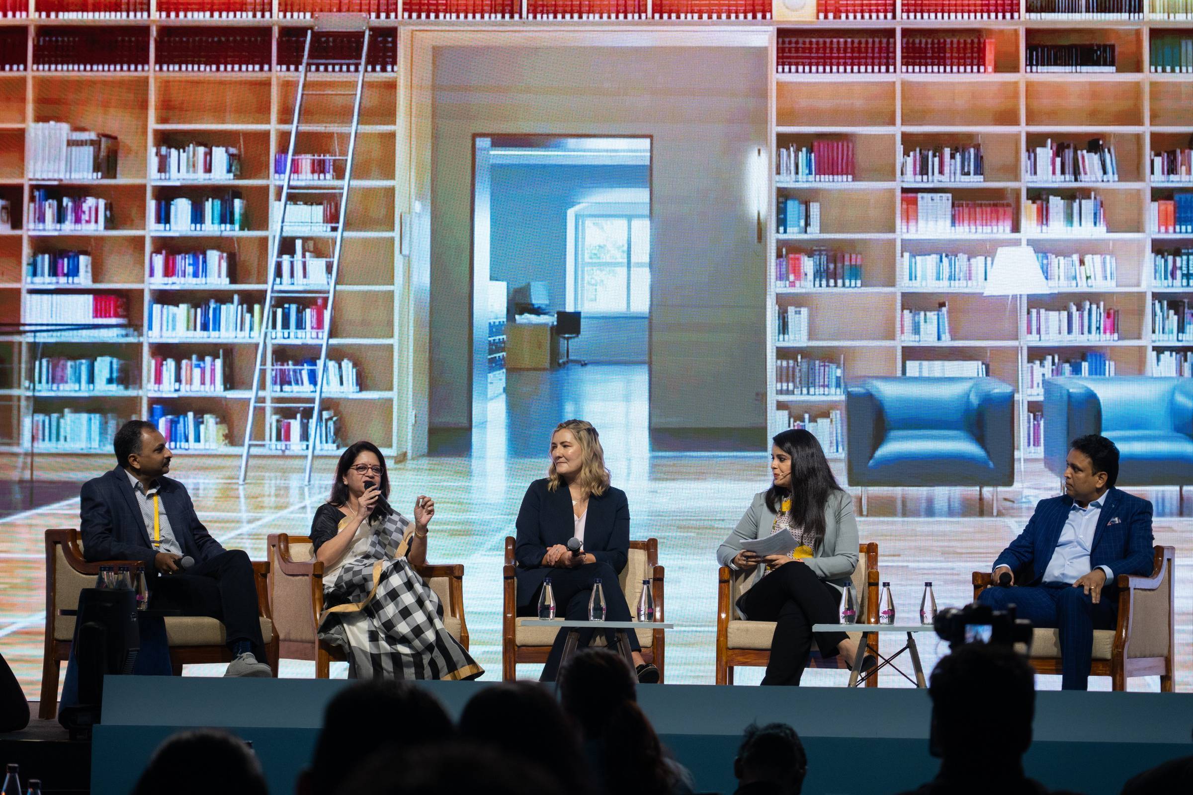Mridu Bhandari moderating a panel discussion