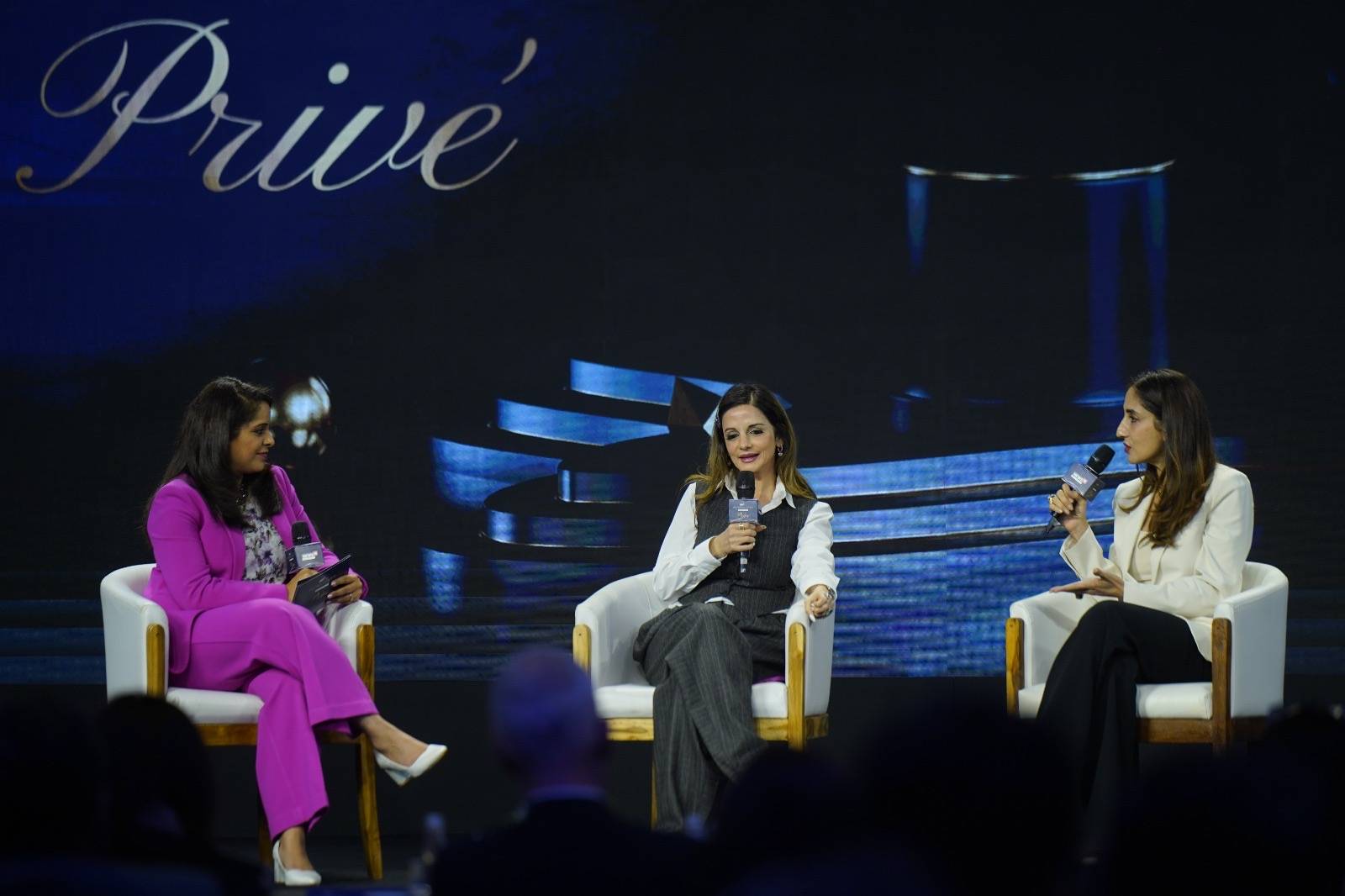 Mridu Bhandari moderating a panel discussion