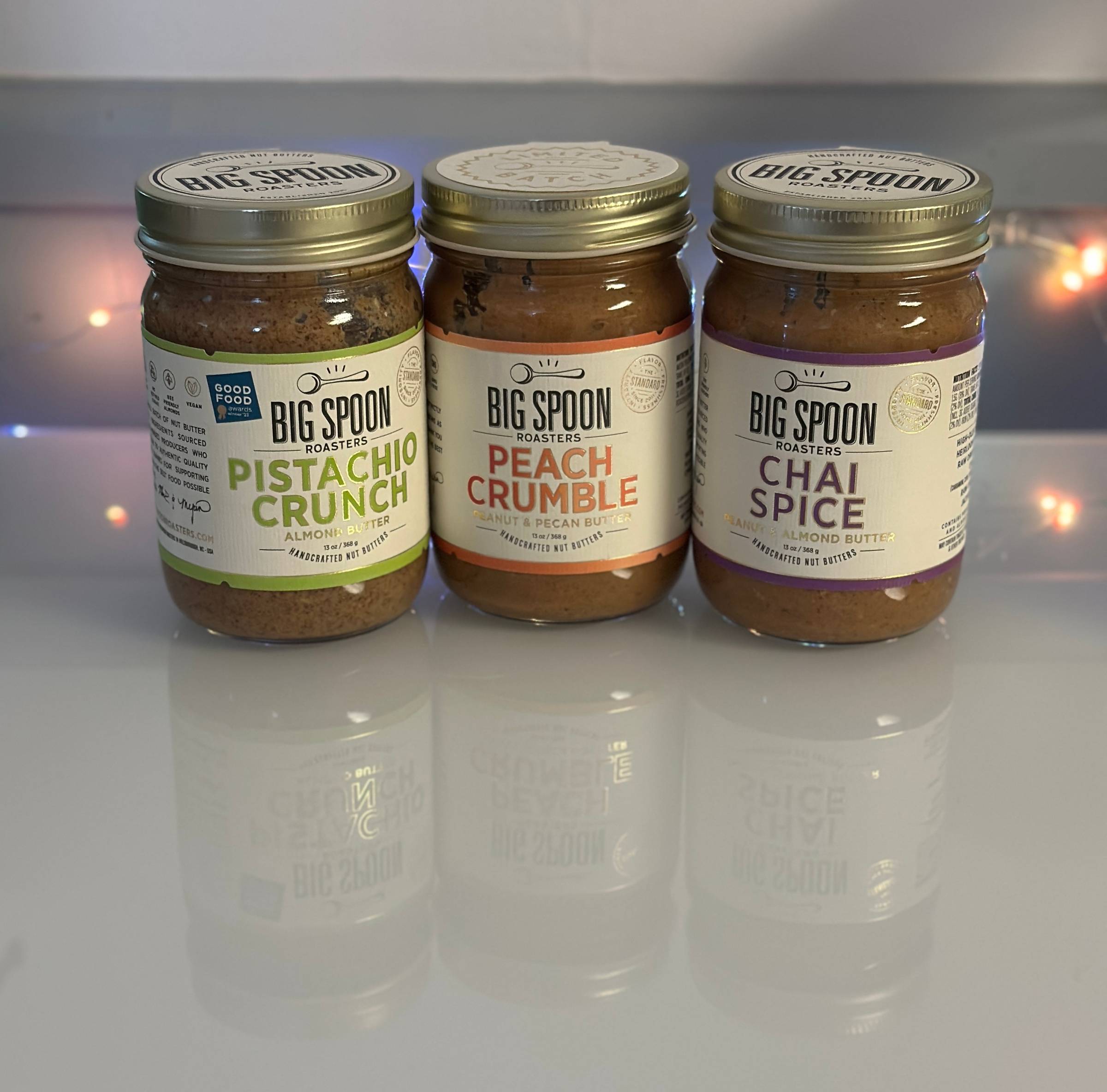 Three jars of Big Spoon peanut butter.