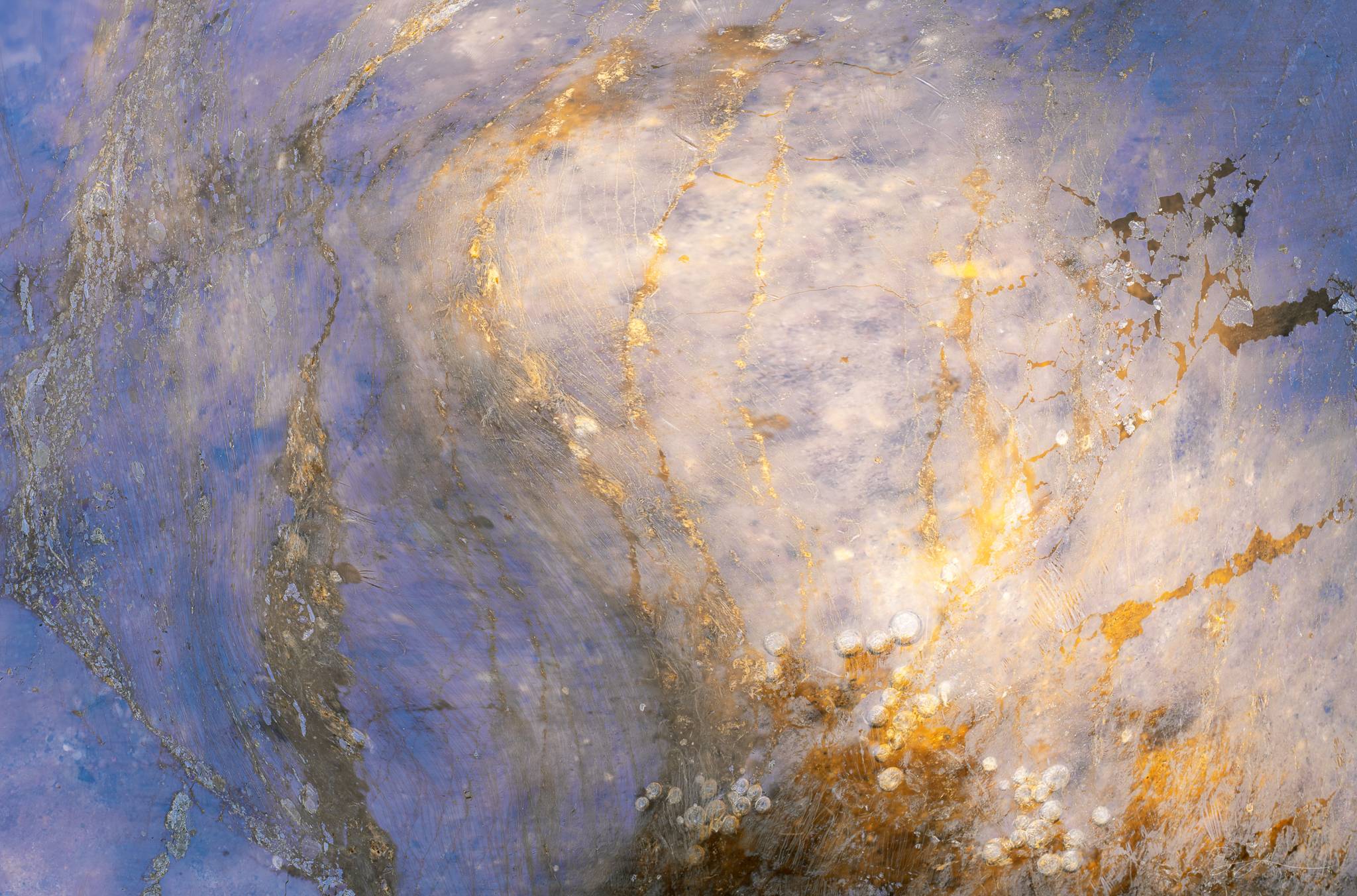 A puddle of natural oils in the desert.