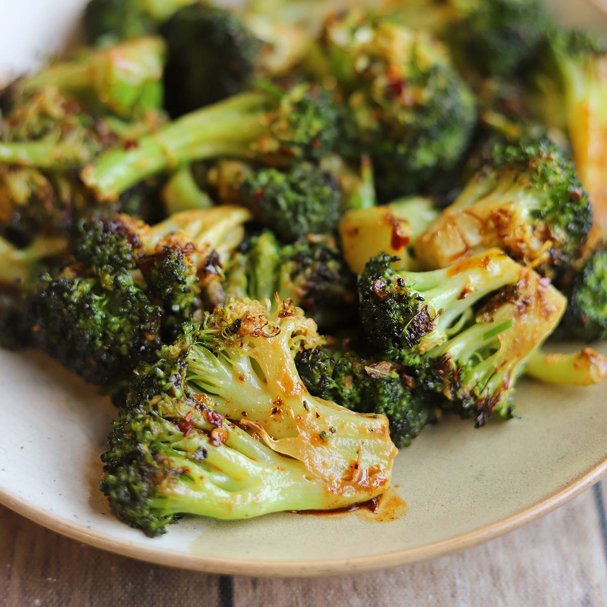 Plate of chili crisp roasted broccoli.
