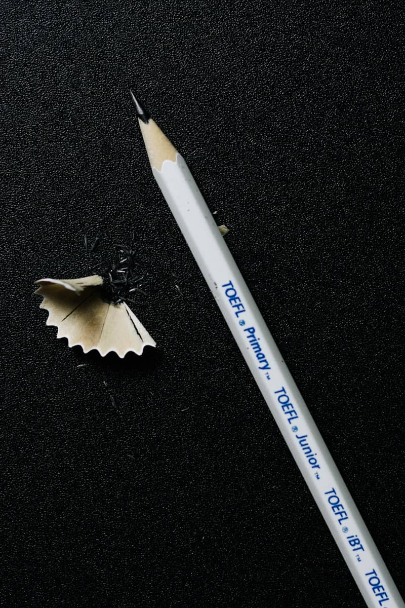 white and blue pencil on black textile
