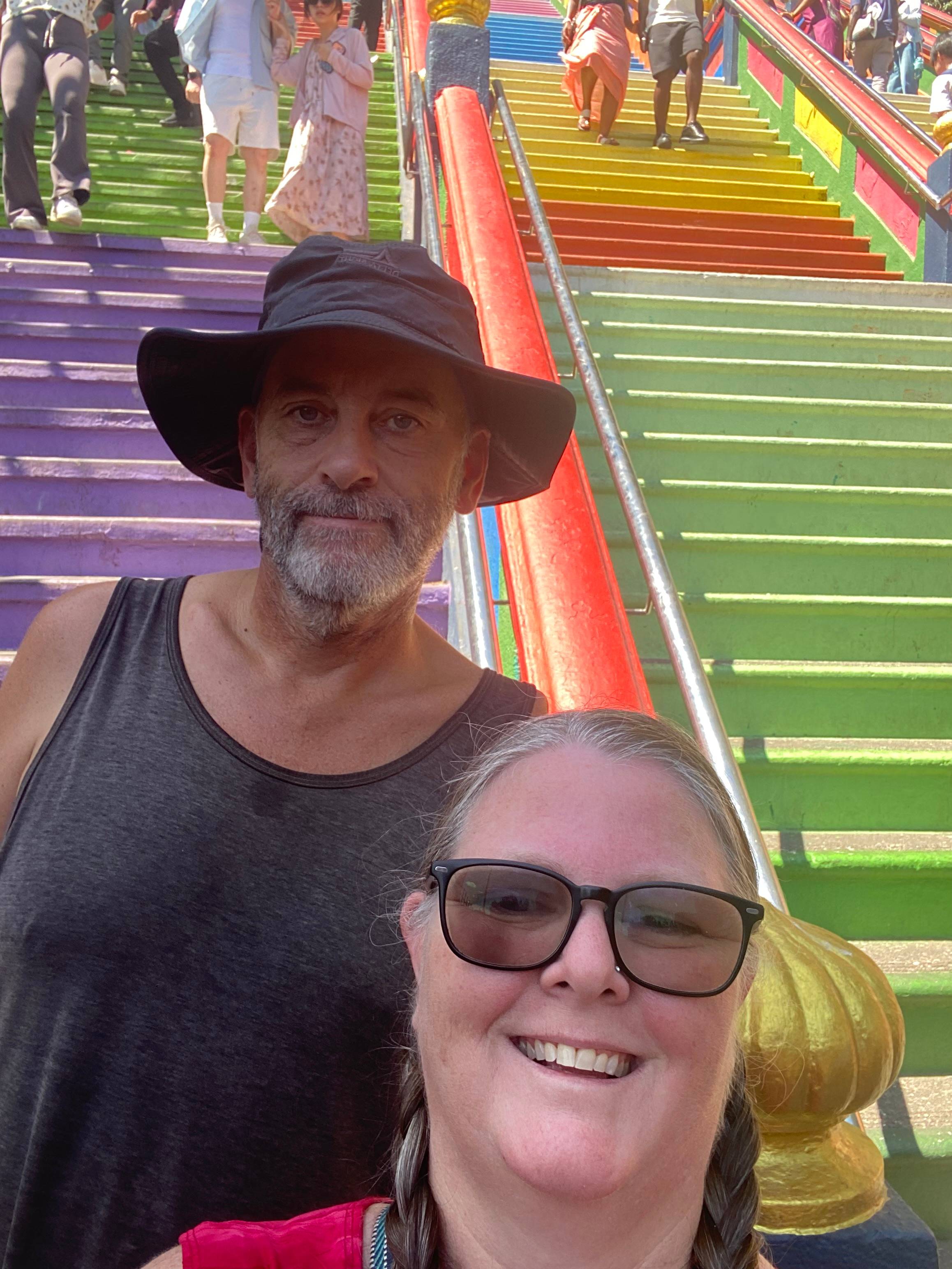Jayson & Tina on the steps leading up to the Batu Caves, Kuala Lumpur, Malaysia