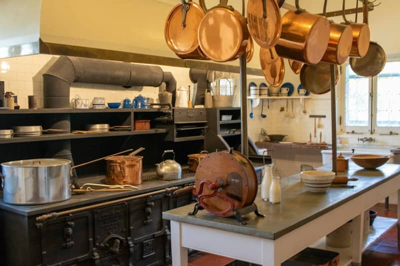 A kitchen filled with lots of pots and pans