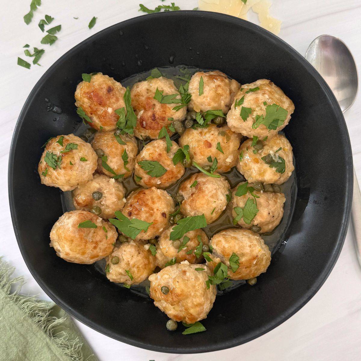 A plate of chicken meatballs. 