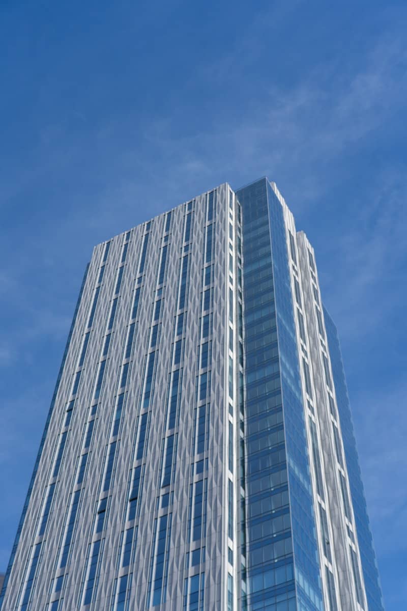 Modern skyscraper against a clear blue sky