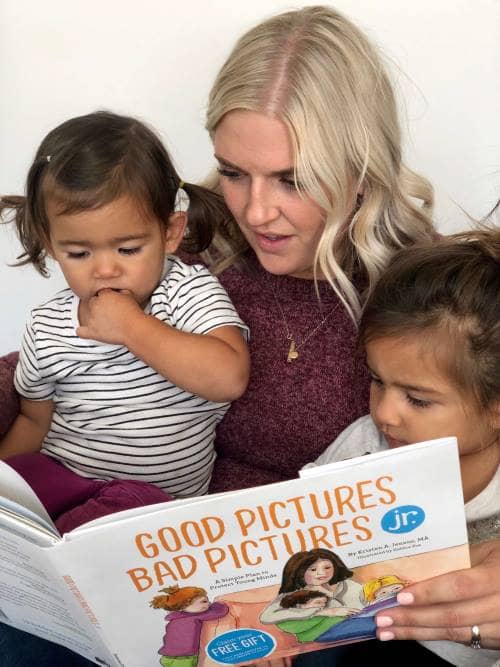 Mom reads Good Pictures Bad Pictures Jr. to her two young daughters