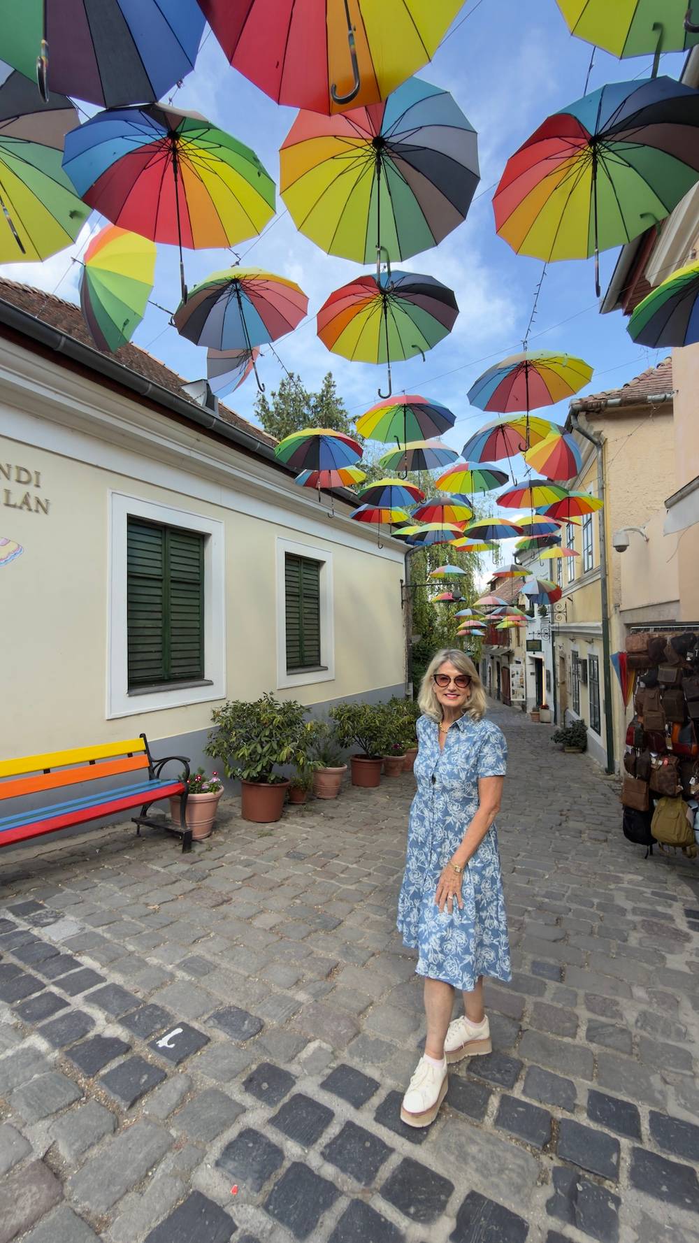 Joanne under umbrellas in Hungary