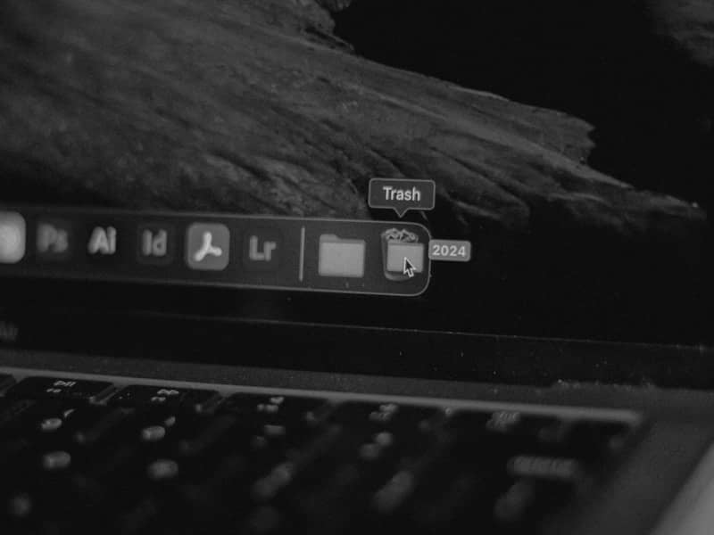 A close up of a laptop keyboard with a blurry background
