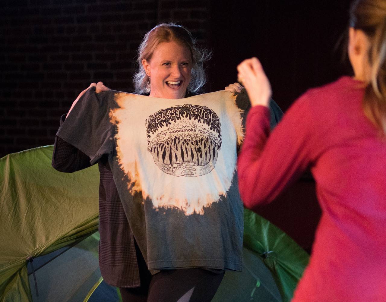 person holding costume t-shirt