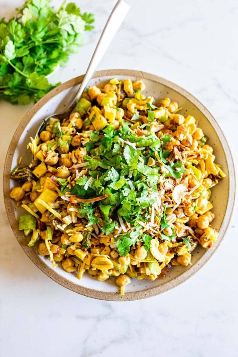 A simple vegan recipe for Curry Chickpea Salad, that can be turned into a healthy wrap with spinach and sprouts. A delicious make-ahead vegan lunch recipe!