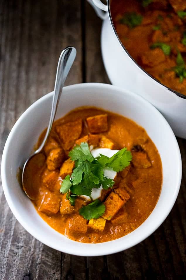 Butternut Tikka Masala in a white bowl with a spoon