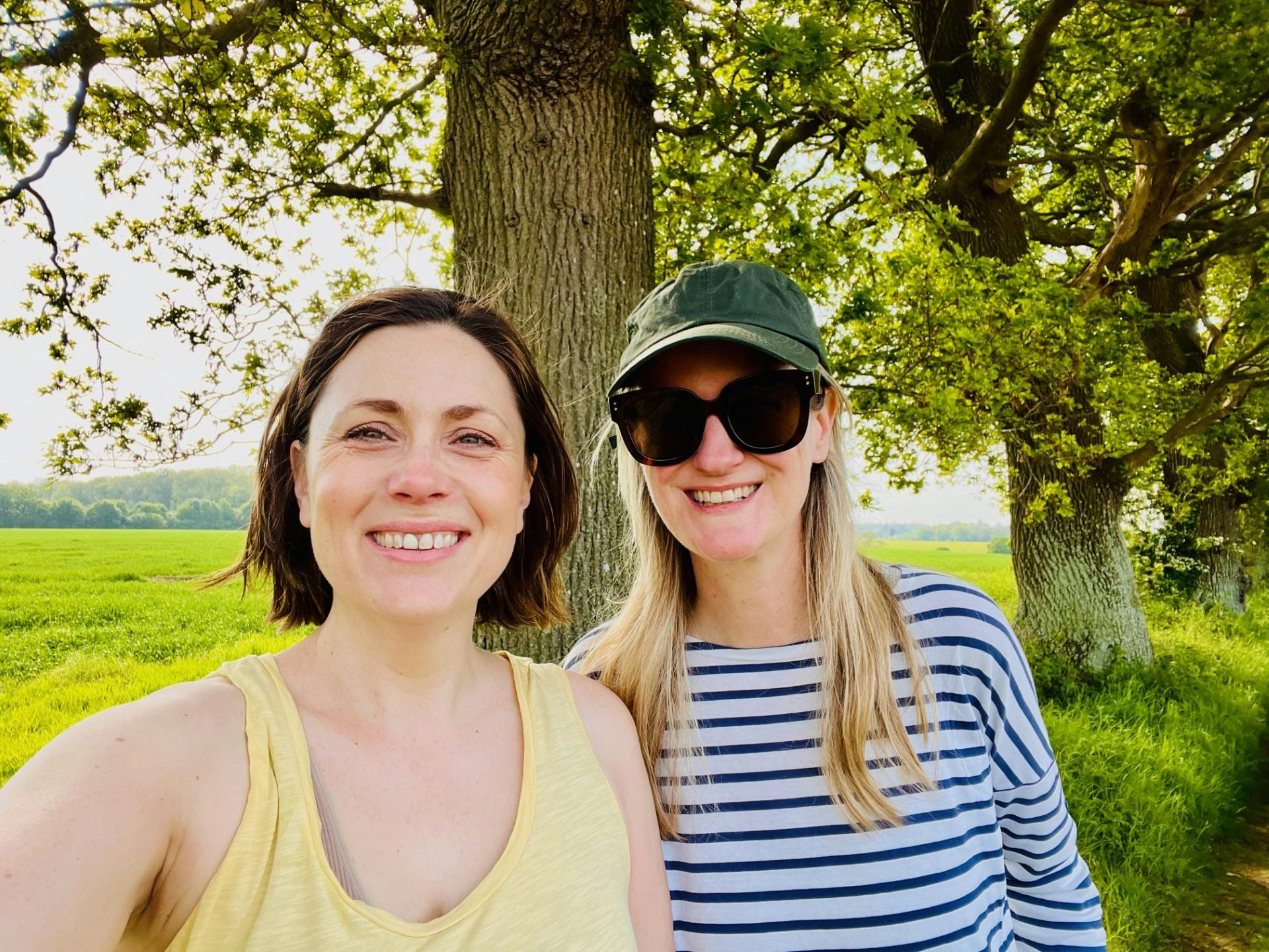 Louise on a walk under the trees with her friend