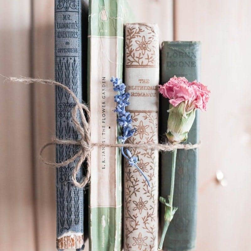 four assorted-title books