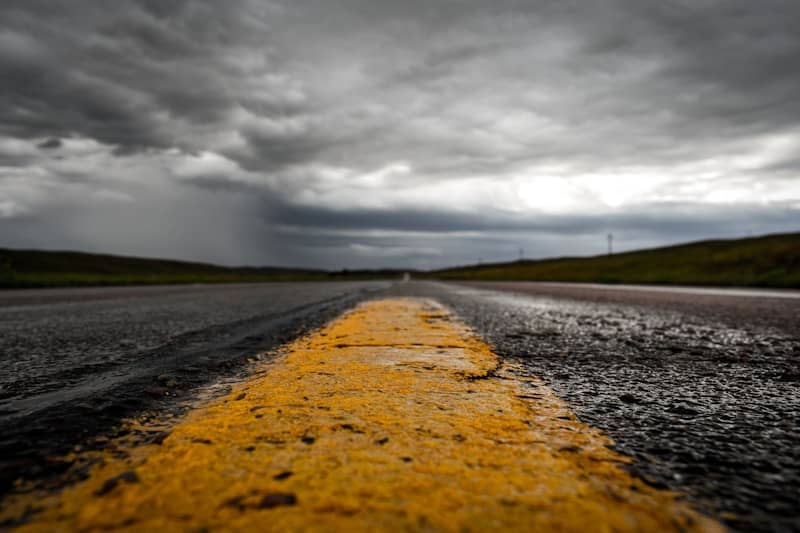 yellow road line photo during dawn