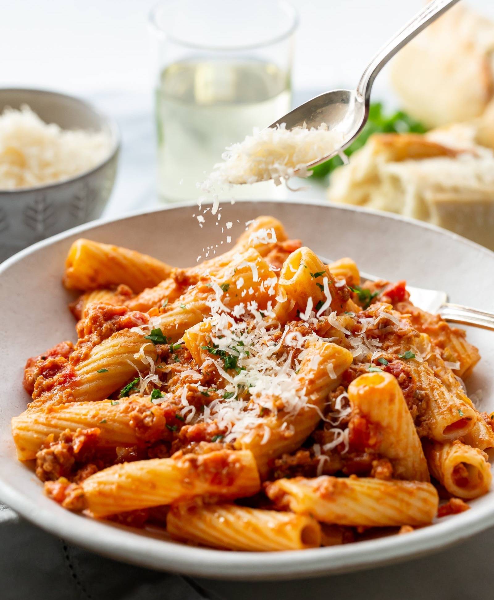 A bowl of rigatoni bolognese