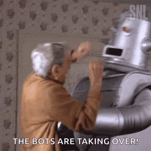  an elderly man is standing next to a robot that says the bots are taking over !