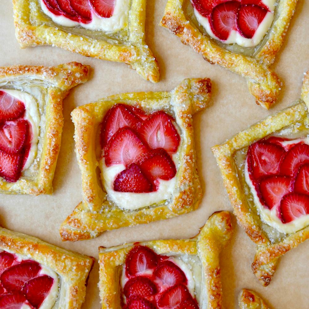Easy cream cheese danish topped with strawberries.