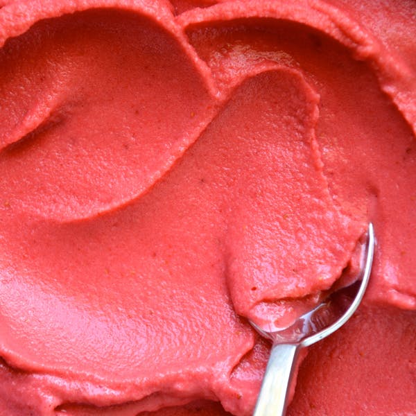 A closeup view of strawberry frozen yogurt.