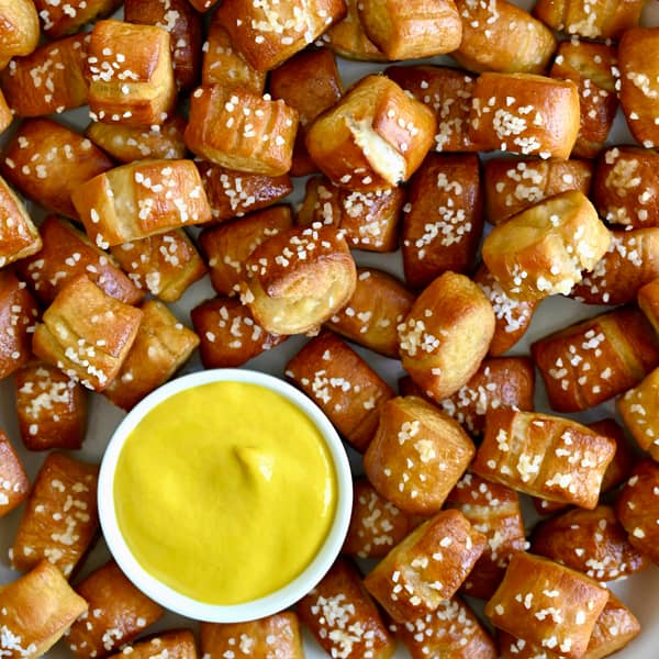 Pasta salad with tomatoes, mozzarella, basil and chicken.