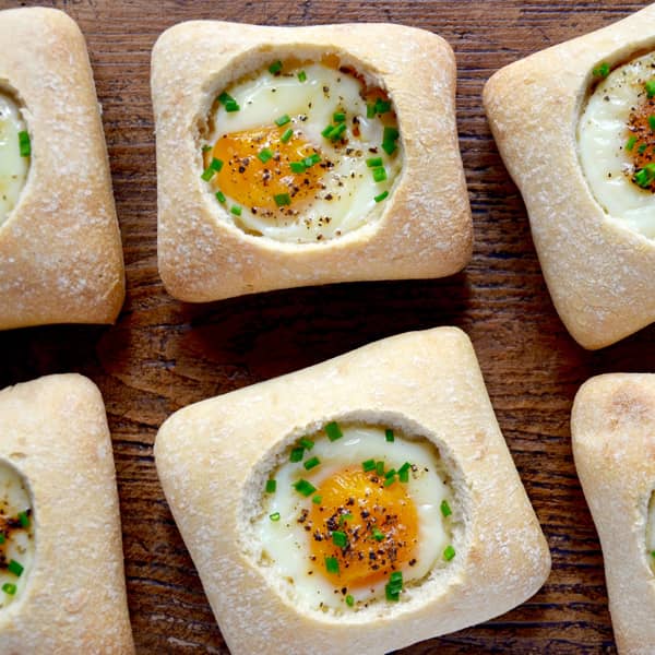 Baked eggs in bread bowls.