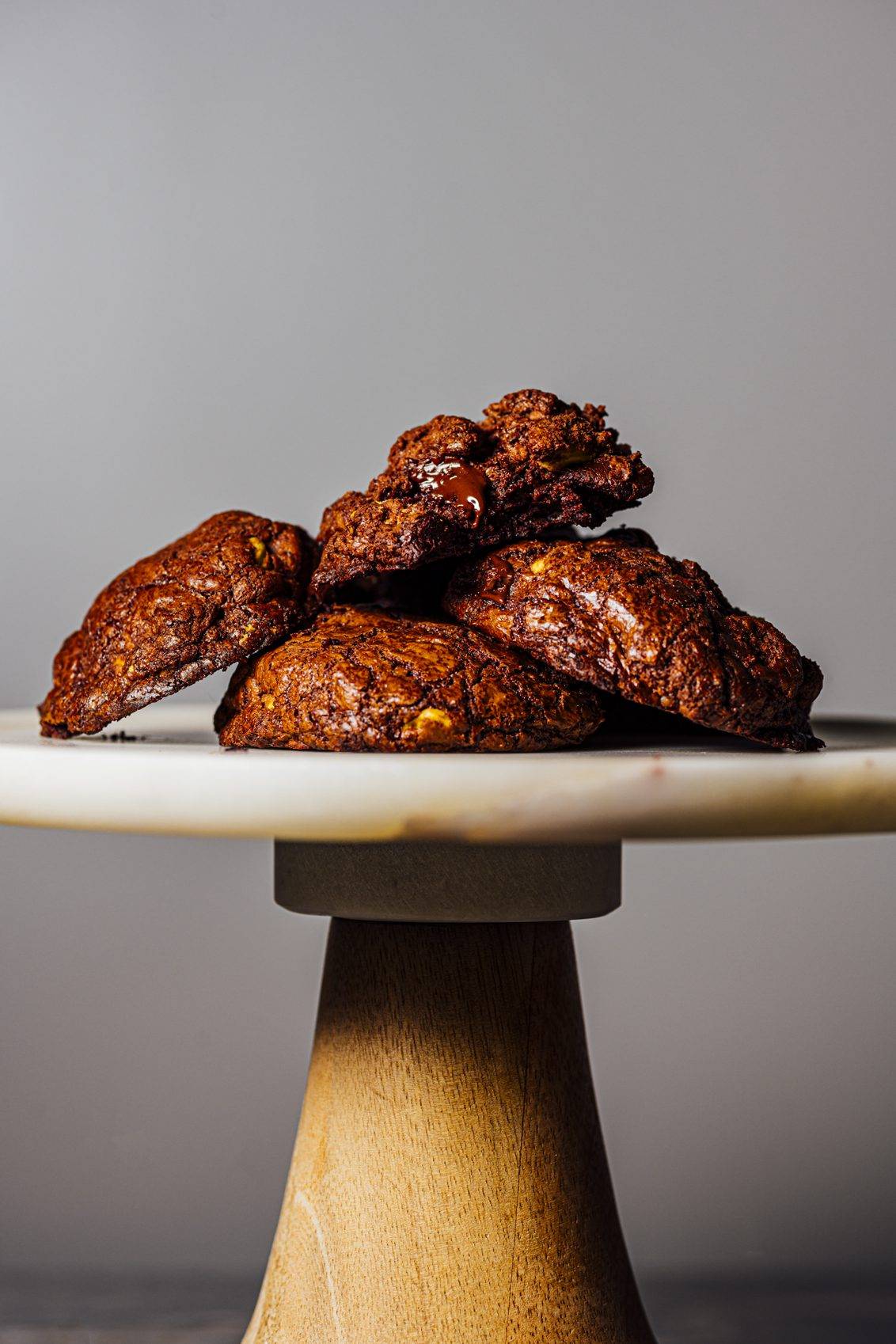 Chocolate Brownie Cookies stacked on a cake stand