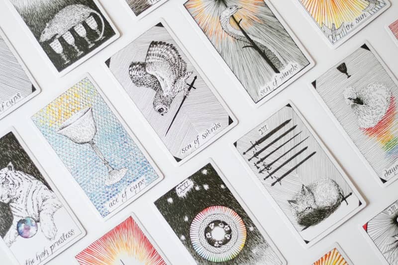 A bunch of cards that are on a table