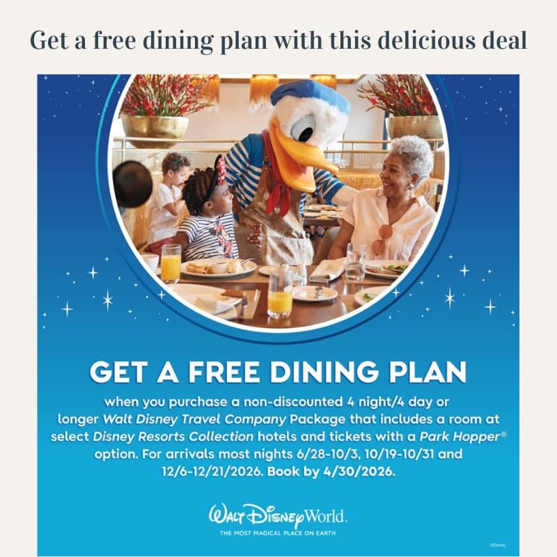 Donald Duck greeting a family dining at a Disney restaurant