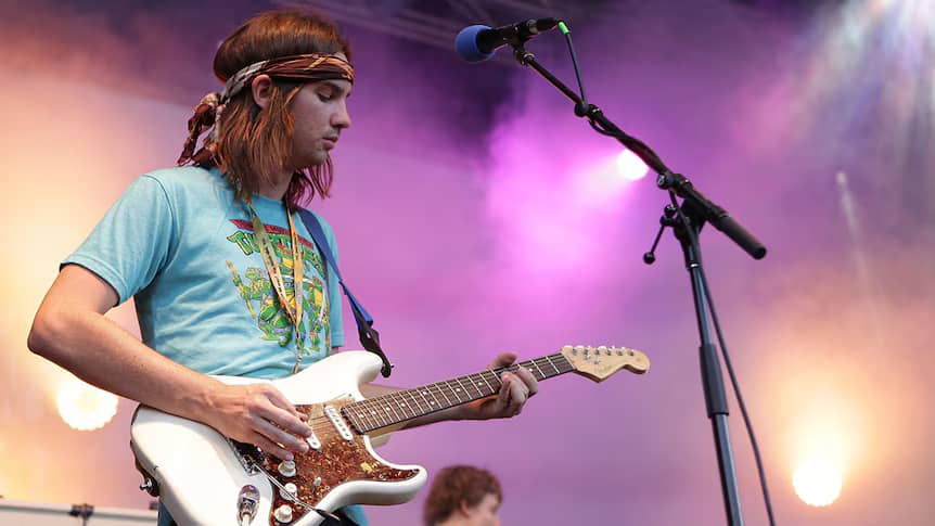 Kevin Parker playing guitar in 2010