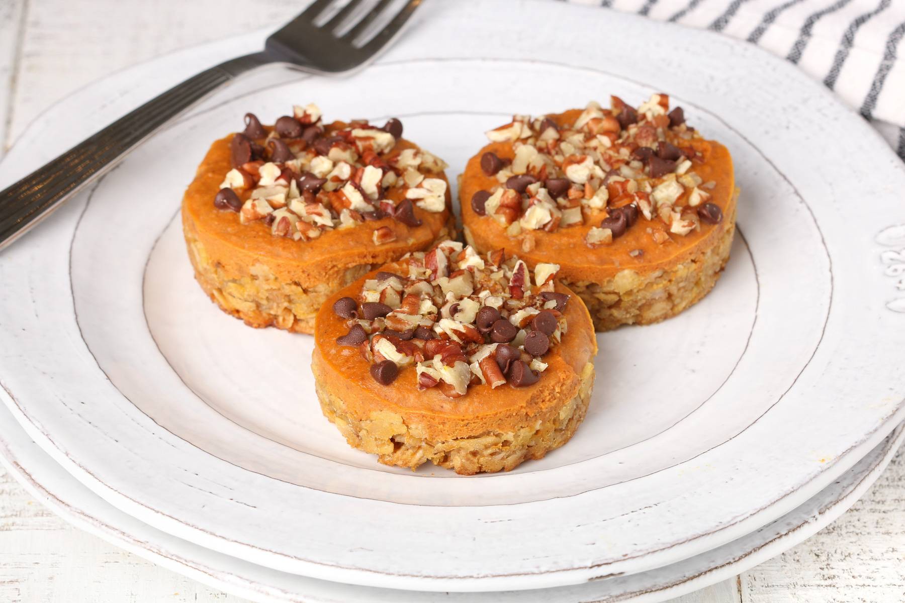 Granola Oat Cups sitting on a white plate. 