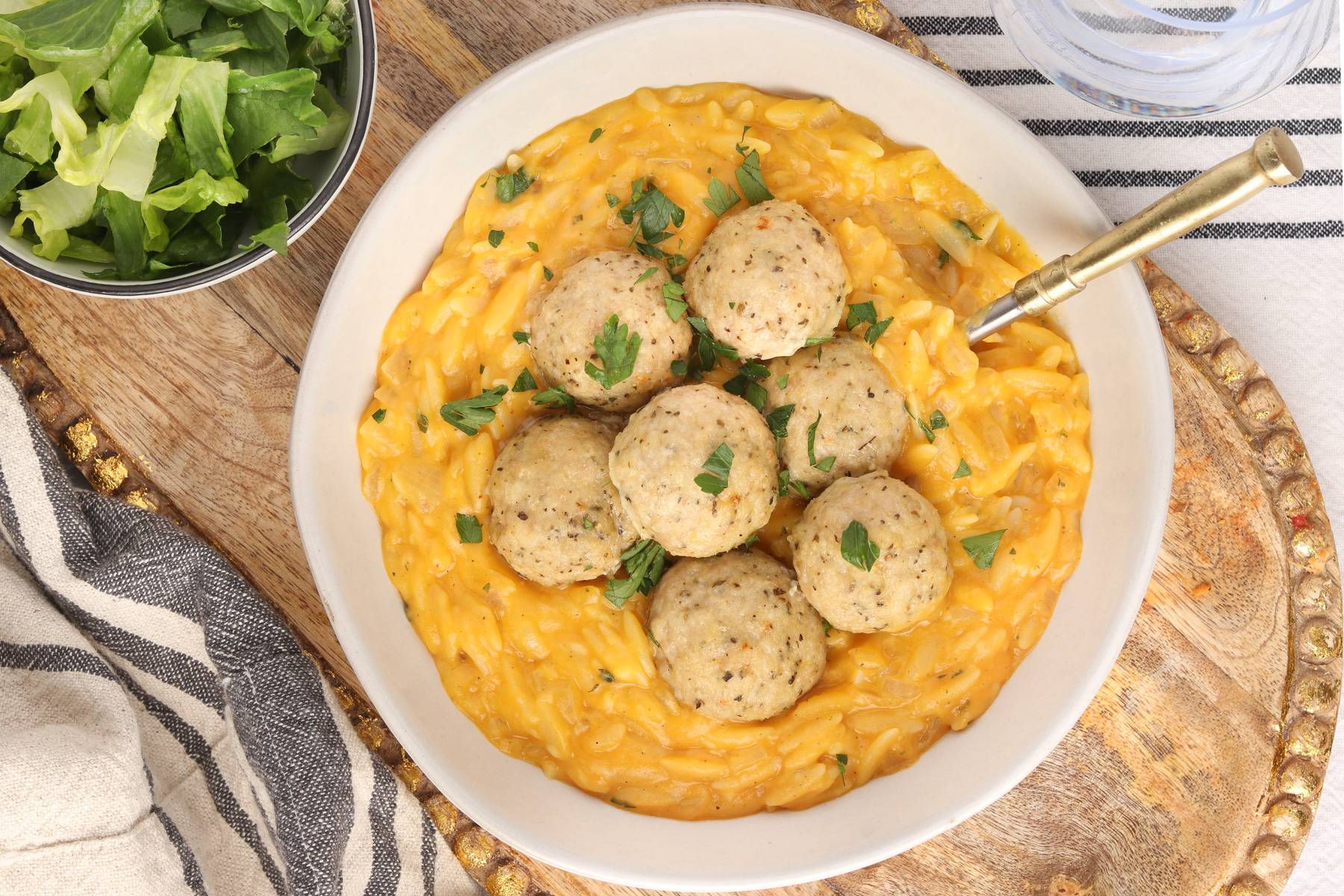 Creamy Butternut Squash Risotto topped with Ricotta Meatballs.