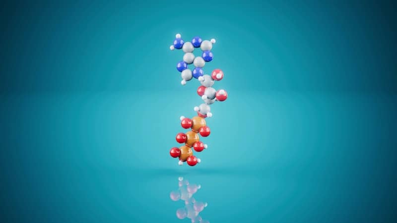 3D molecular model of atp on a blue background.