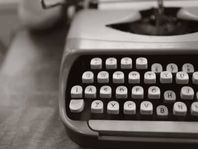 A black and white image of a typewriter