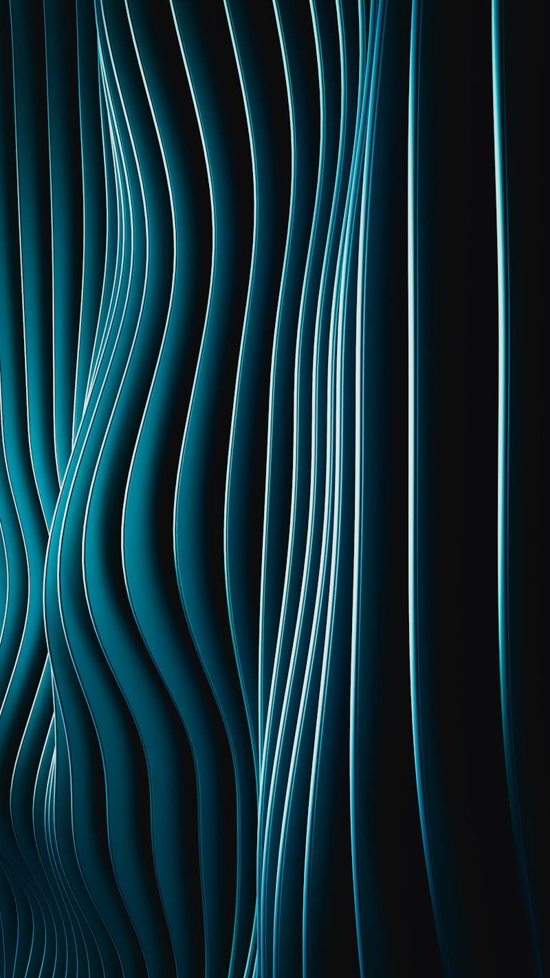 Abstract teal wavy lines on a dark background