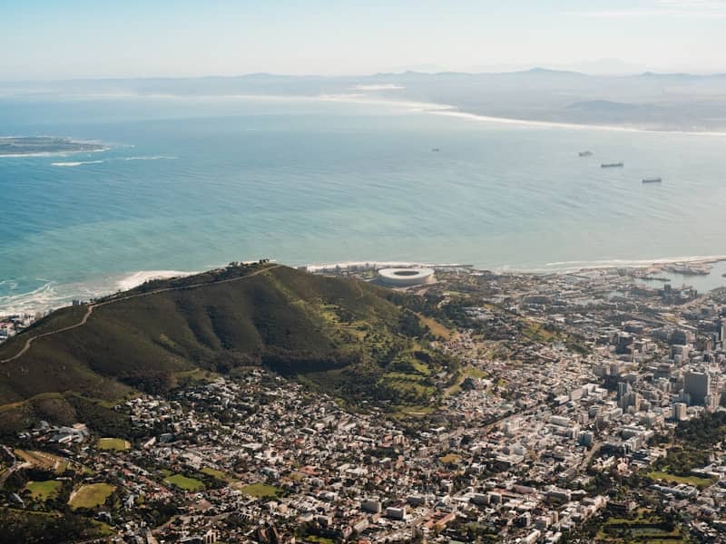 An aerial view of a city and a body of water