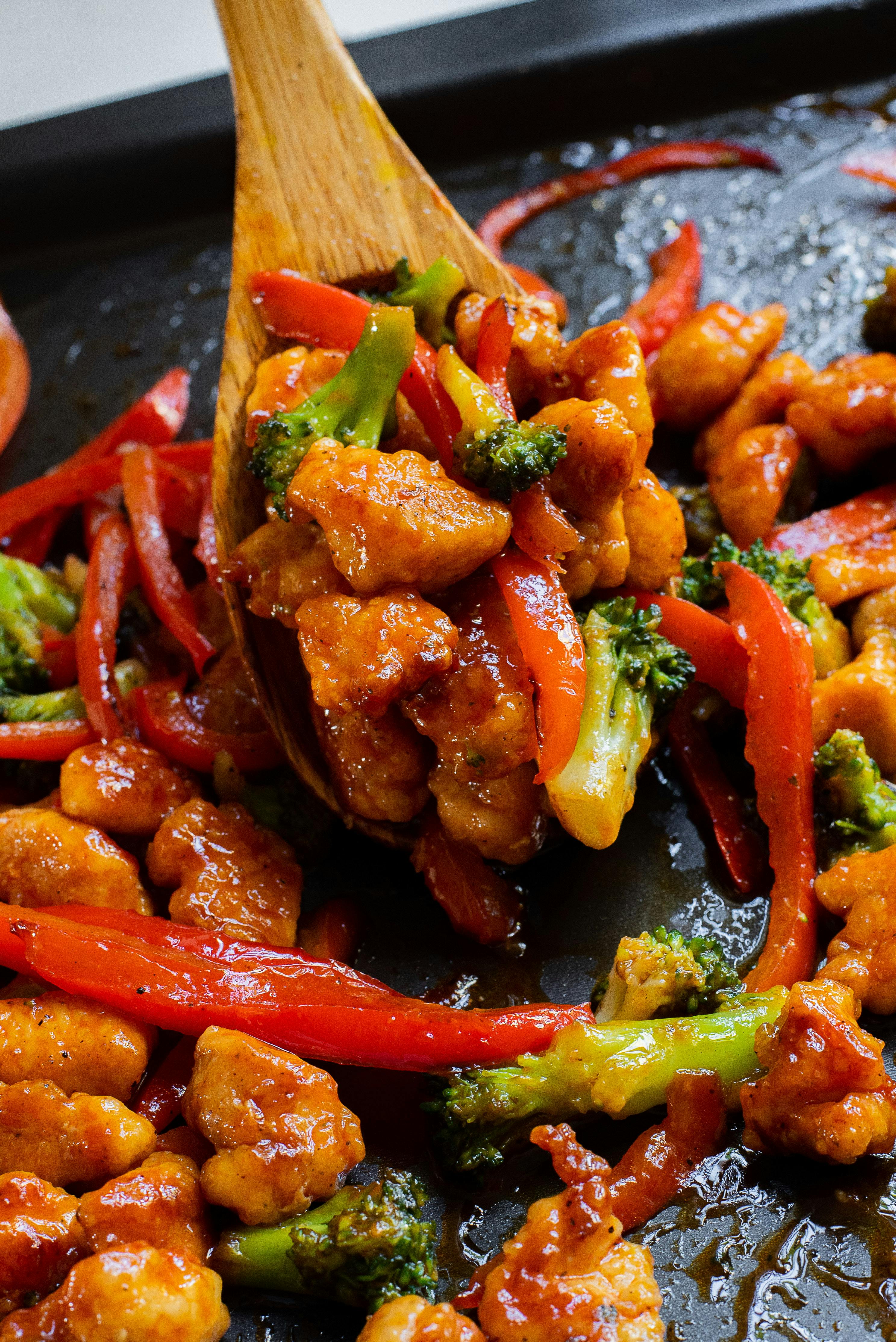 honey buffalo chicken being lifted with a spoon