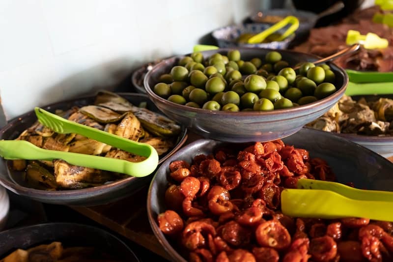 a group of bowls with food in it