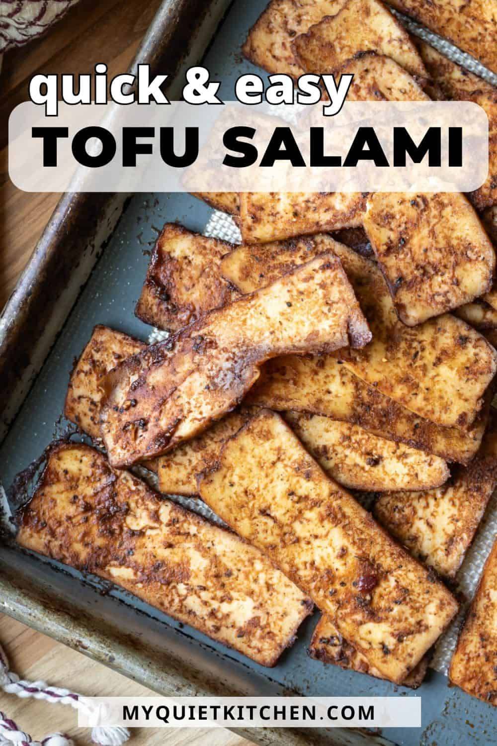 Vegan tofu salami is quick and easy to make and packs big, bold flavors. Thinly sliced tofu is coated in a salami-inspired paste and baked until perfectly chewy. Ready in 30 minutes, it's great for sandwiches, salads, and snacking on straight off the baking sheet.