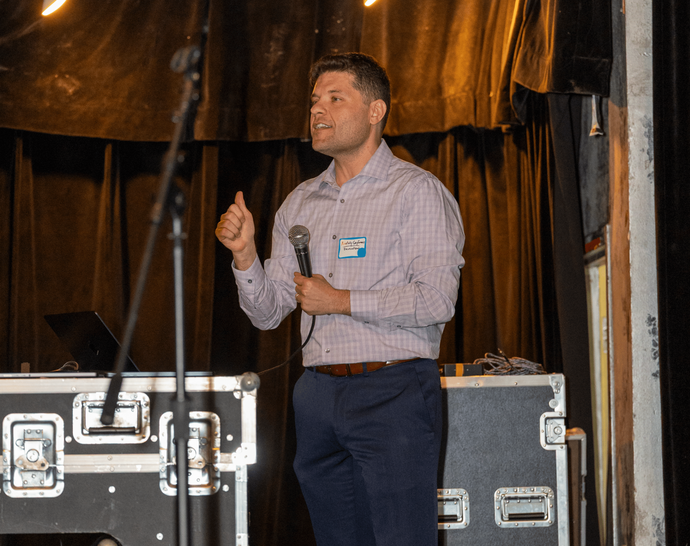 Anatoly presenting on stage in Boston