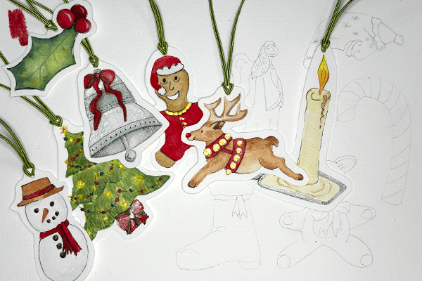 Embroidery designs were traced onto cold press watercolor paper and a little over half are painted while some are traced and ready to paint.