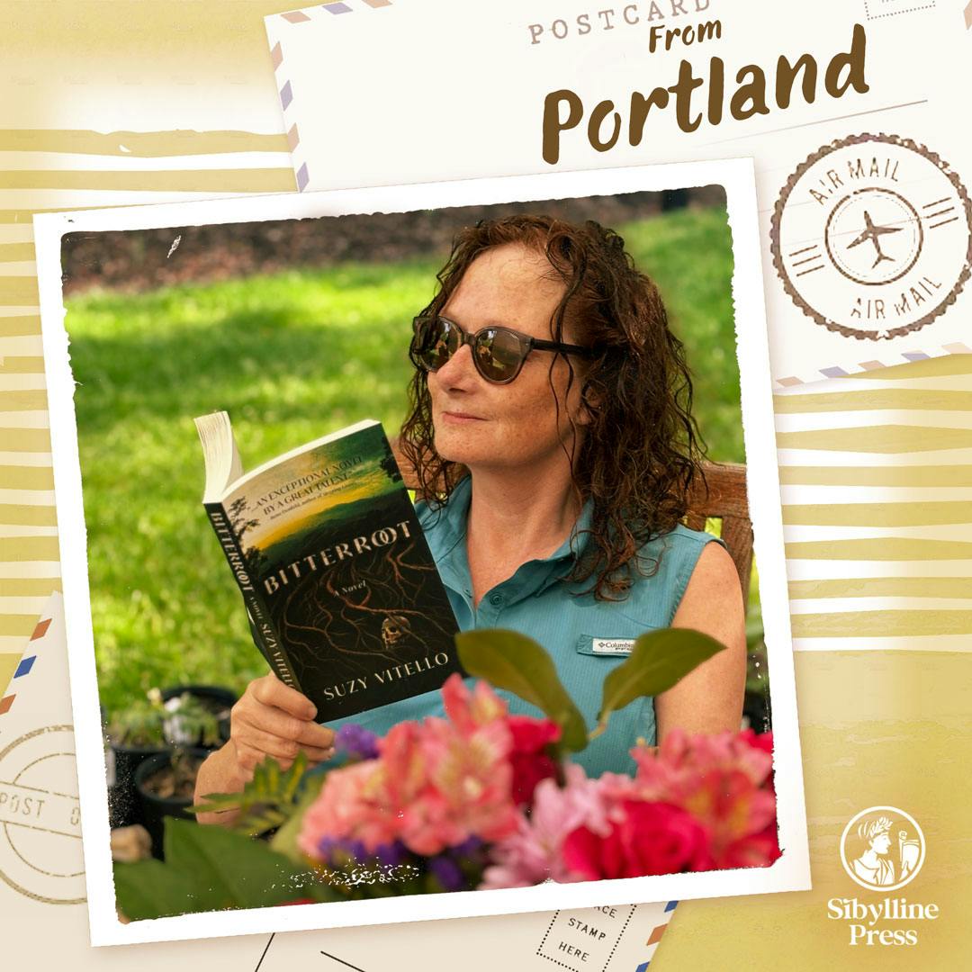 A photo of Sibylline author, reading her book in Portland