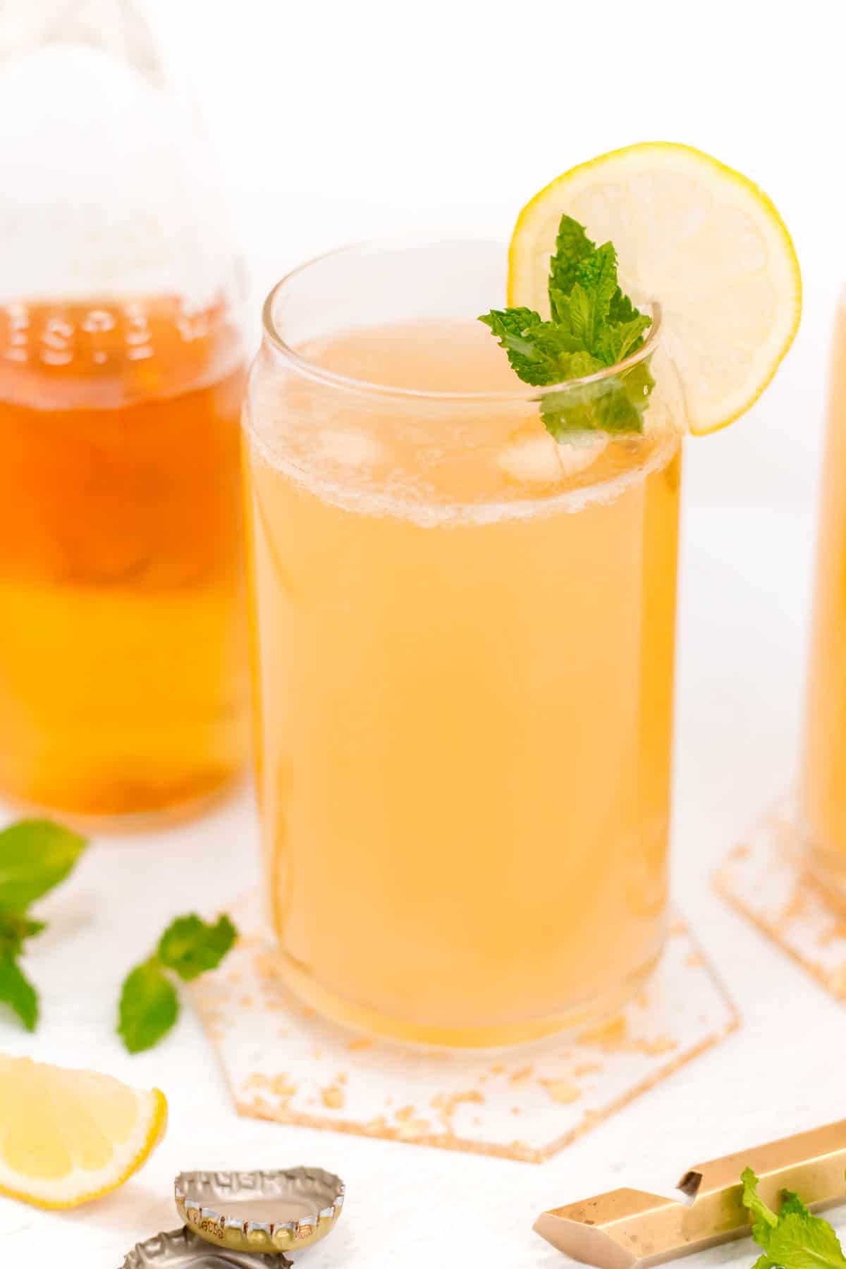 A pale beer cocktail in a can glass.